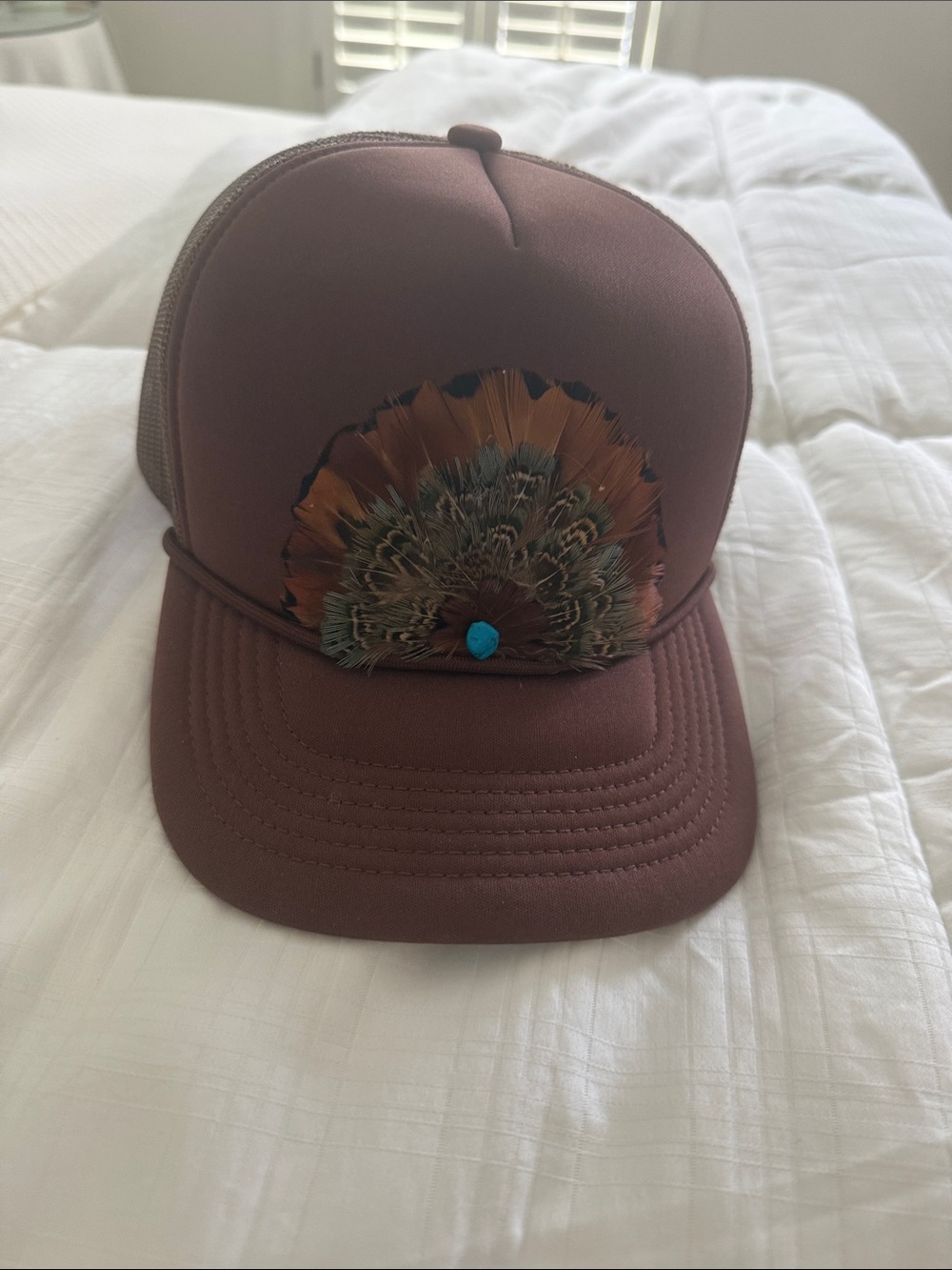 Women's Brown Feather Accent Trucker Hat with Turquoise Detail